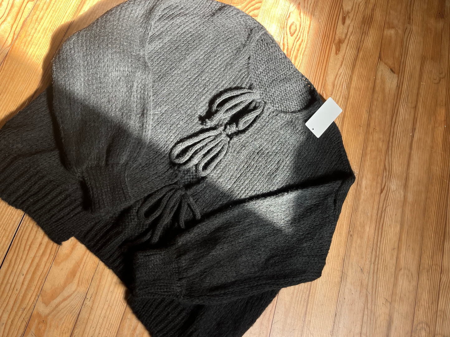 Pull à nœuds NY noir